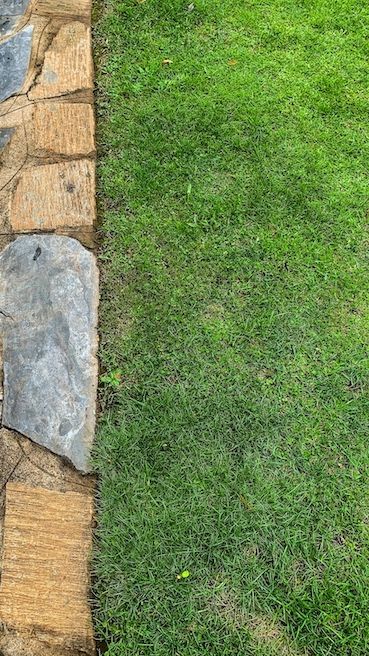 rock edge of a well landscaped lawn